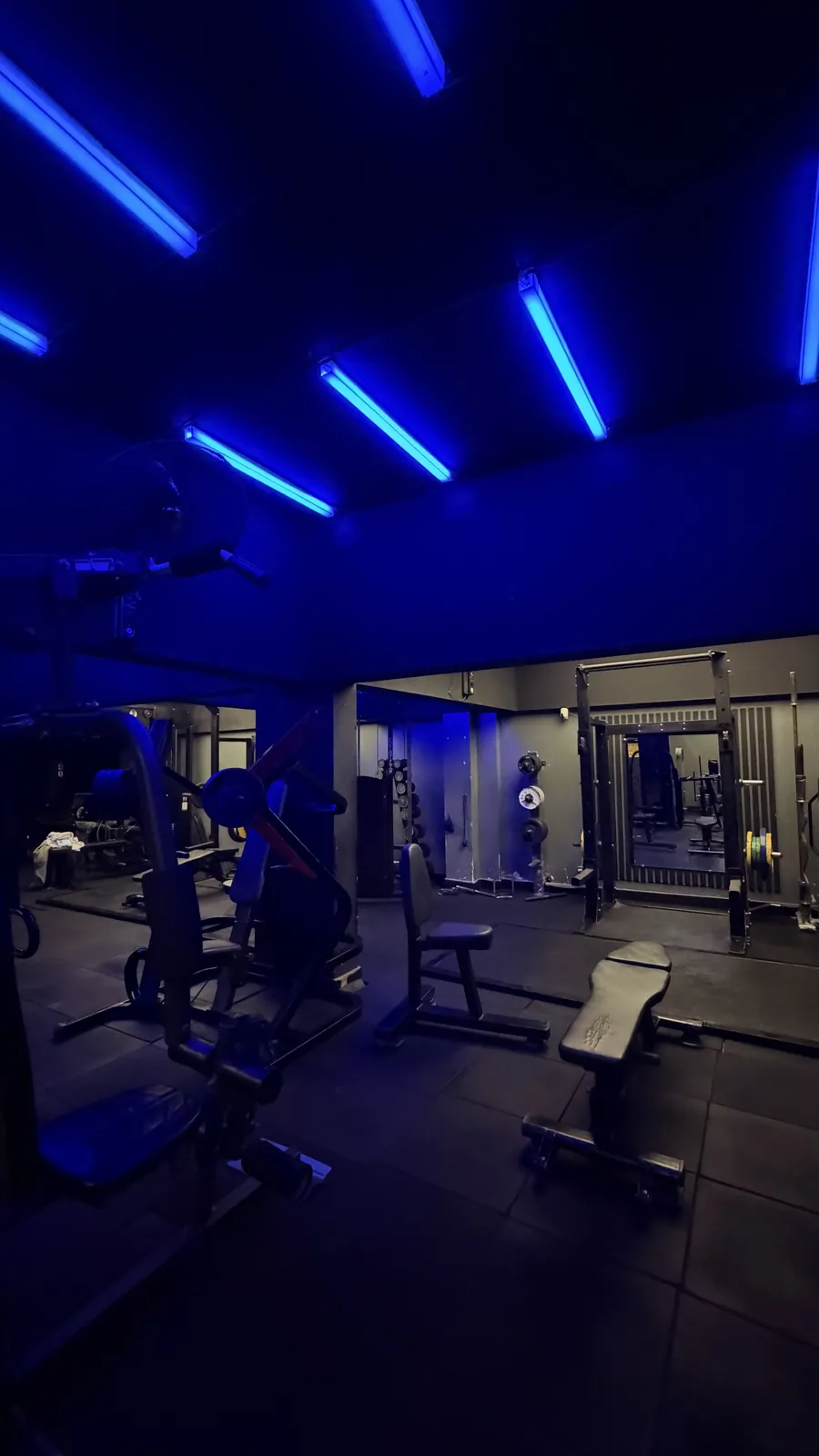 Benches and racks on the Hanma strength floor in Gulistan e Johar